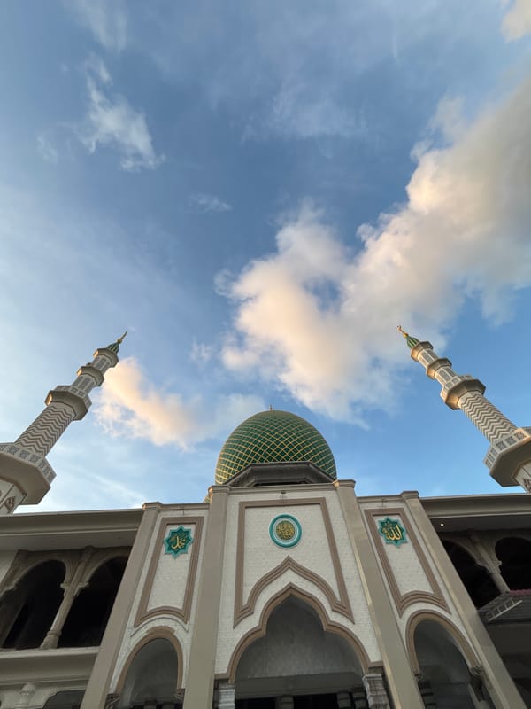 Mosque with green dome photographed in Lhokseumawe, Indonesia