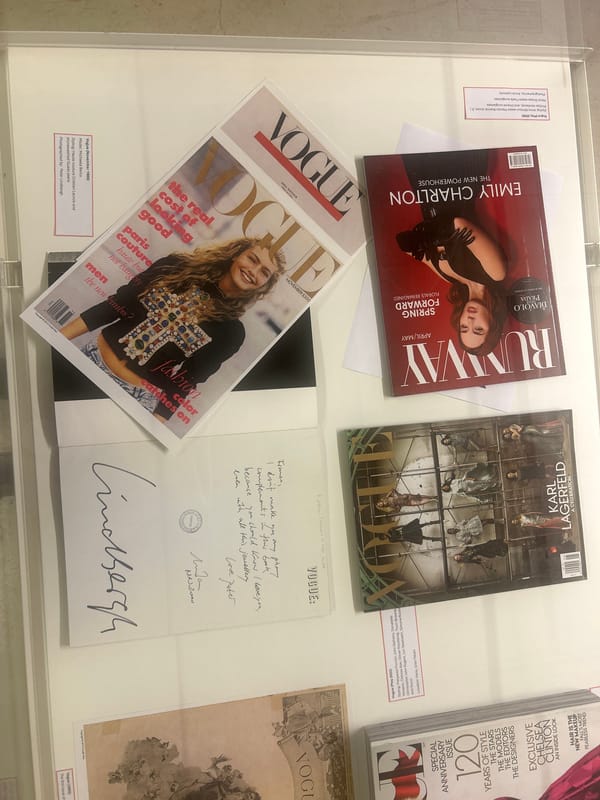 Fashion magazine display featuring Vogue observed at Milan exhibition