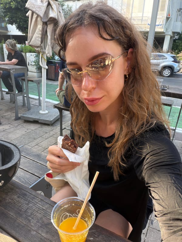 Afternoon brownie break at an outdoor table in Tel Aviv