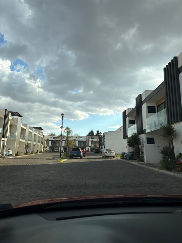 Evening street view captures modern architecture in Cholula Mexico