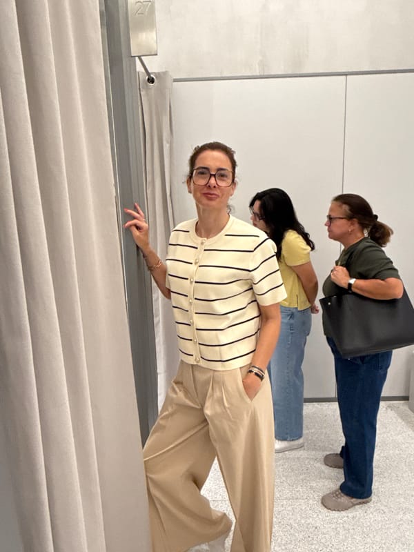 Women try on clothes in Matosinhos retail store