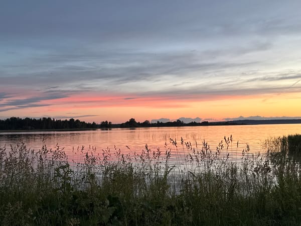 Midsummer sunset over the Chëksha River, Elovo, Russia