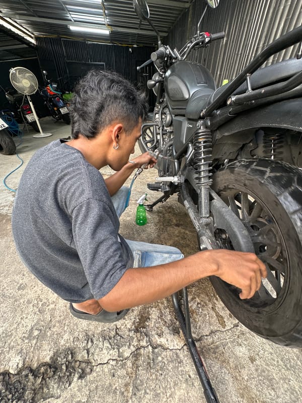 Motorcycle wash day at a Karon garage