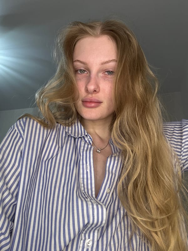 Woman takes multiple selfies in Perm apartment