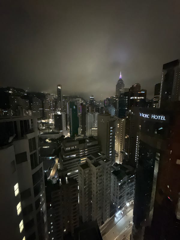 Aerial view captures illuminated Hong Kong skyline at night