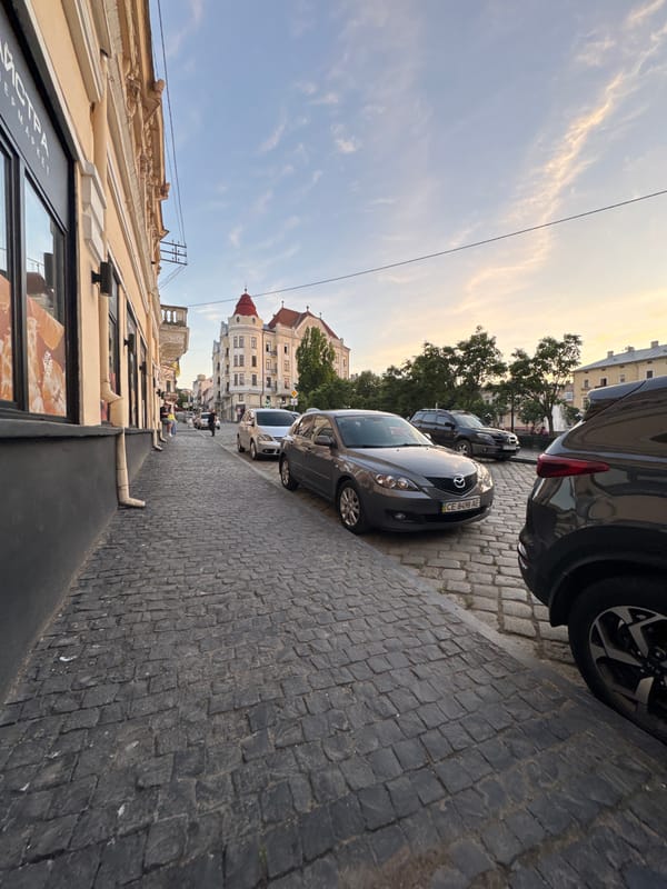 Wandering Chernivtsi's cobblestone streets on a late June afternoon