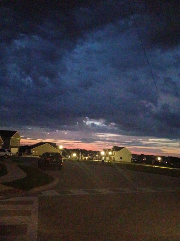 Richmond neighborhood at dusk, July 4th evening sky