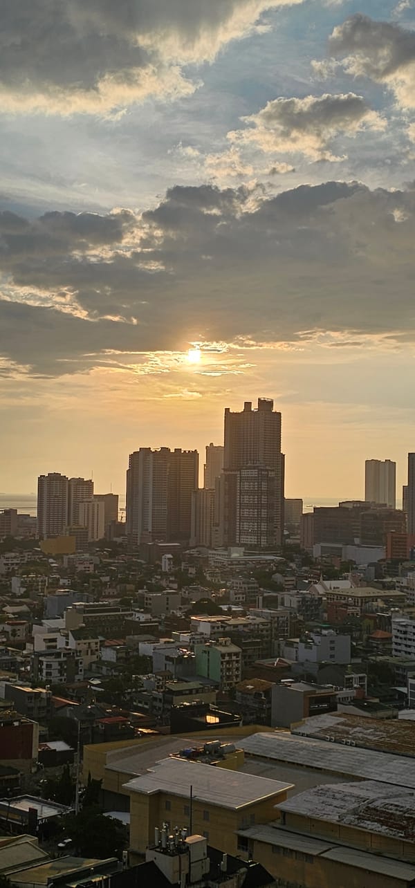 Makati skyline and highway interchange at sunrise
