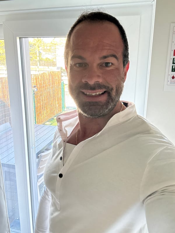 Man takes cheerful selfie in Bredene, Belgium