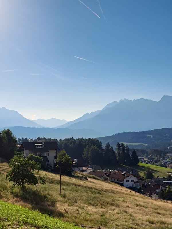 Sunny morning in a European mountain village valley