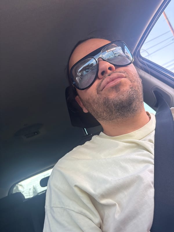 Passenger rests in slow-moving vehicle through Puebla streets