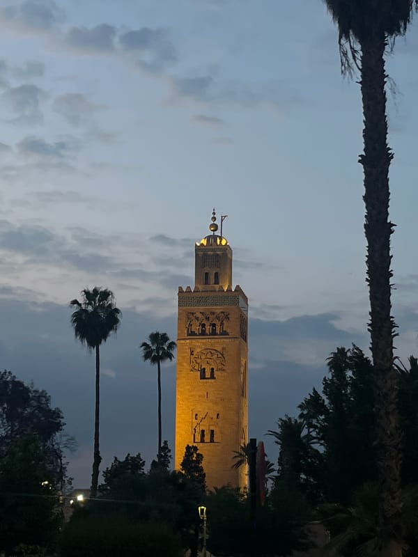 Koutoubia Mosque minaret glows golden at twilight in Marrakesh