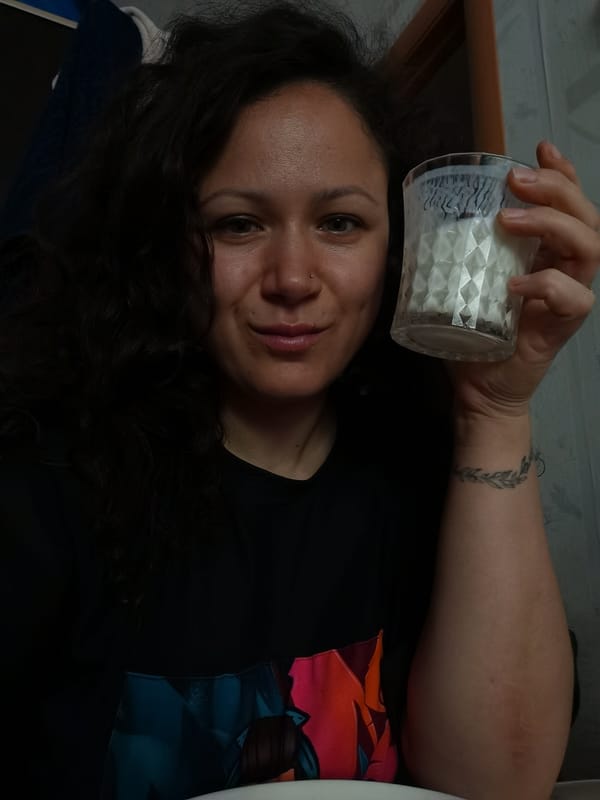 Woman documents breakfast routine with cat in Chaikovsky, Russia