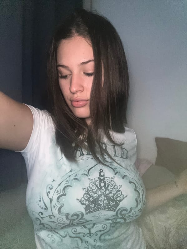 Women in Boca Juniors jerseys photographed in Buenos Aires bedroom