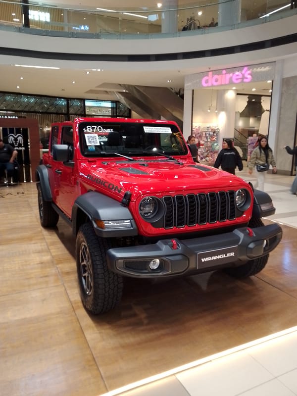 Car displays, beer promotions spotted in Asuncion shopping mall
