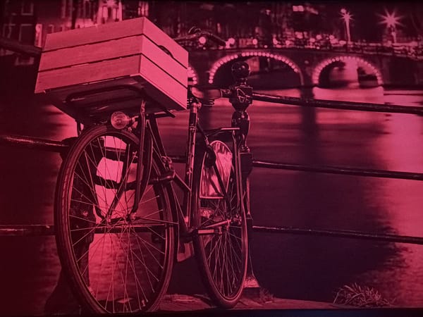 Evening scenes captured in Helmond: vintage bicycle, bedroom interior