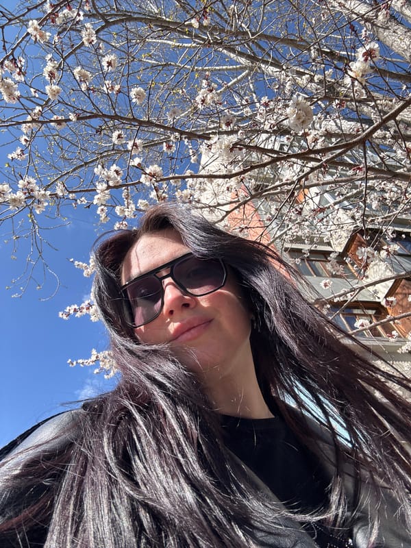 Woman documents spring day outing in leather jacket