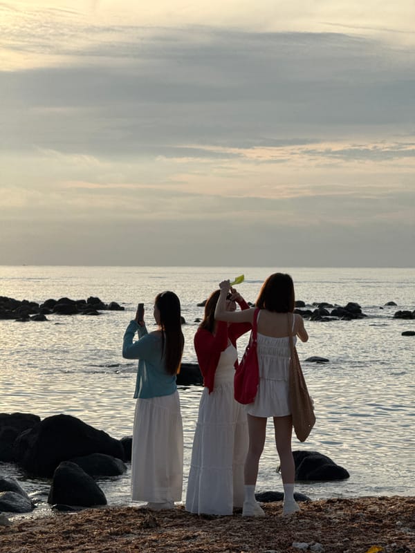 Sunset silhouettes on the rocky shores of Lý Sơn Island