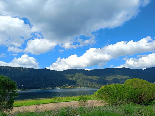 Morning landscape captured in Sarnitsa, Bulgaria shows lake and mountains