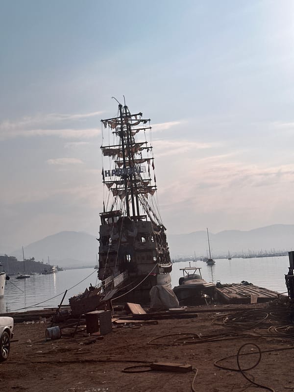 Fethiye marina at dawn, replica pirate ship in the yard