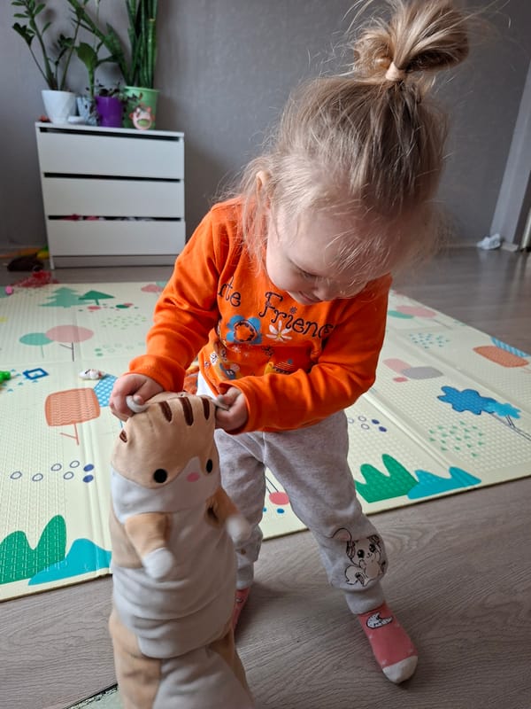 Family snapshots capture toddler, baby, and French Bulldog during afternoon