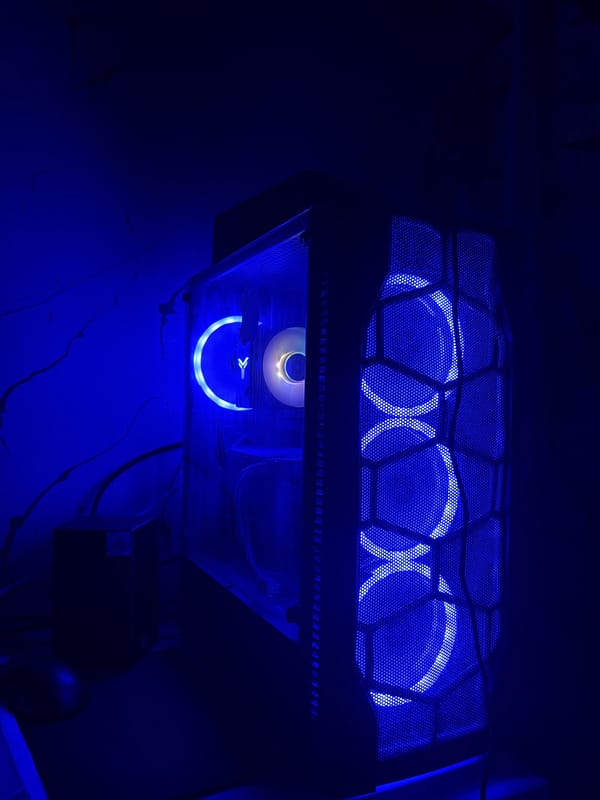 Blue-lit gaming setup and random home snapshots in Karaganda