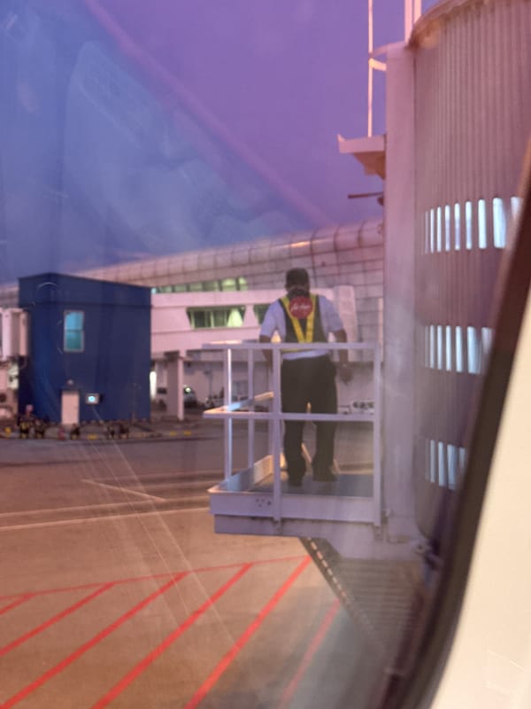Evening transit through KLIA, tarmac to terminal and duty-free