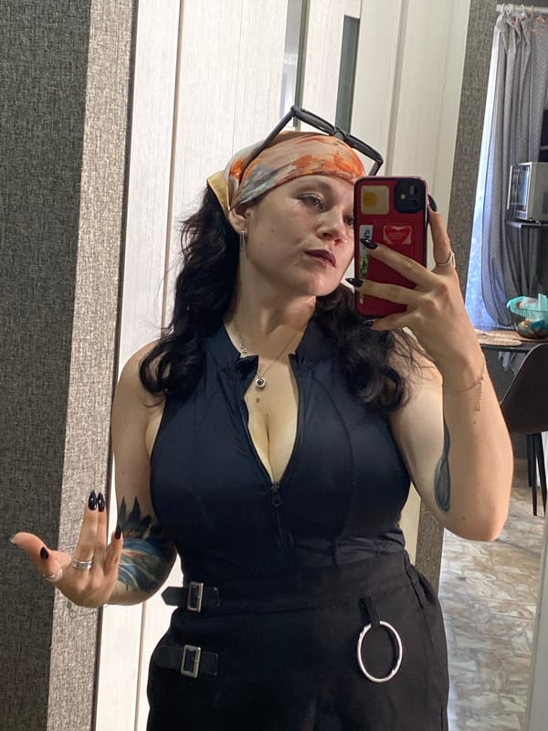 Mirror selfies and outdoor shots in Chaikovsky, same look throughout.