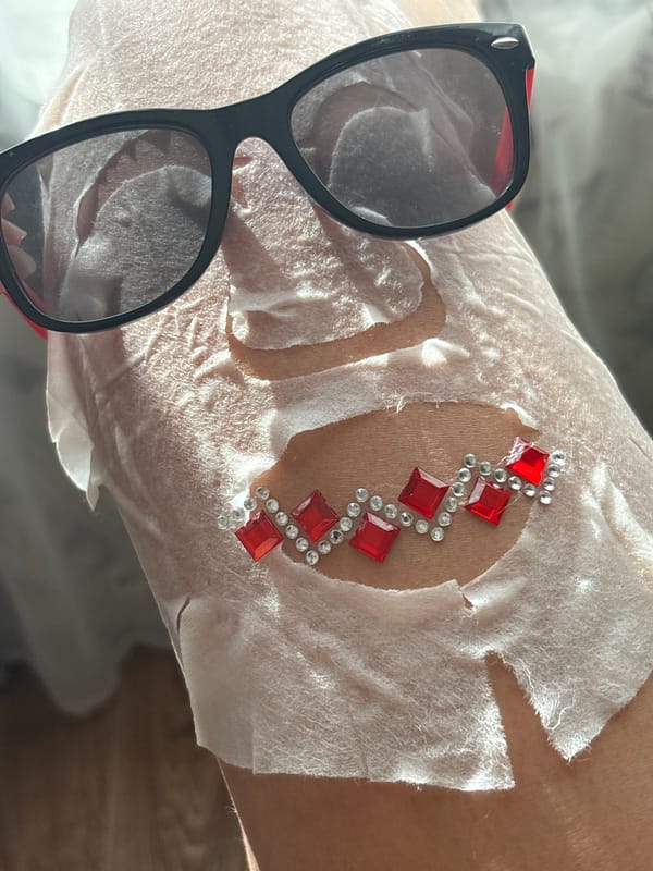 Person applies white sheet masks to limbs in Chaikovsky