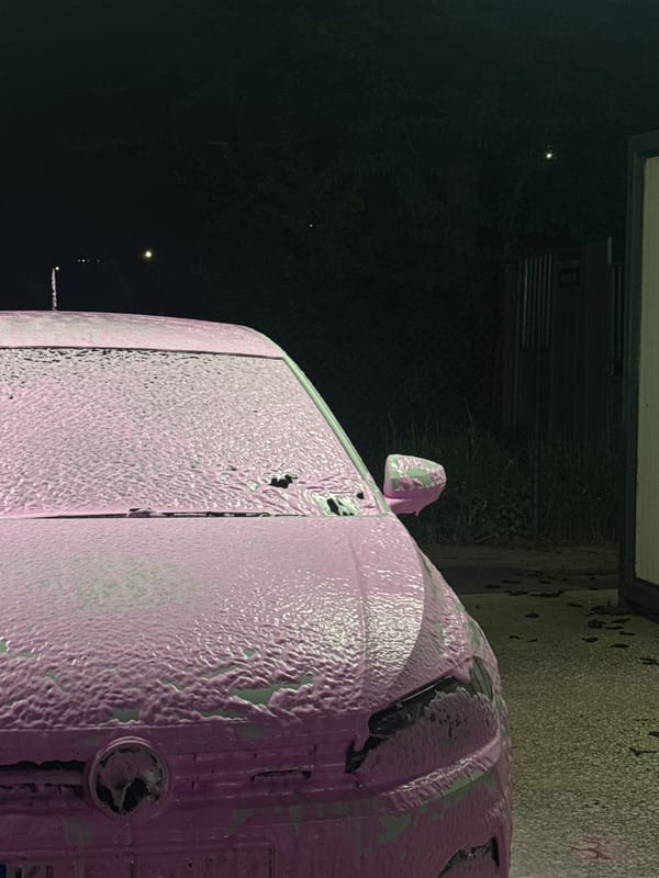 Car wash in progress at night in Dupnitsa, Bulgaria