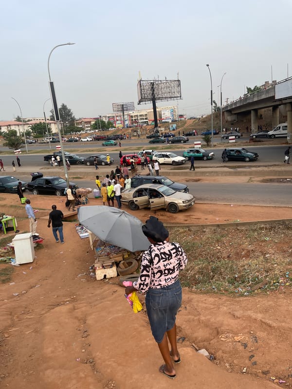 Hazy afternoon street scene documented in Abuja, Nigeria