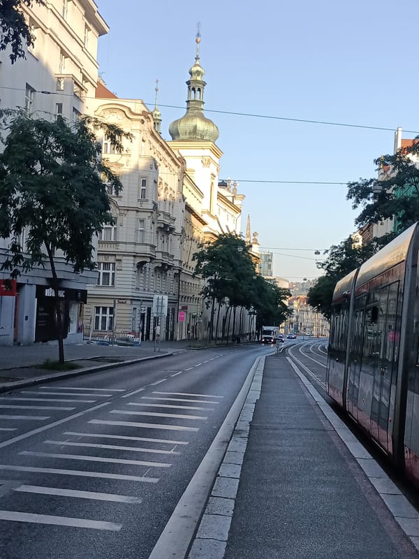 Prague tram corridor caught in low-angle morning or evening light