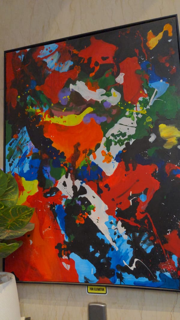 Abstract art and elevator panel observed in Abuja building