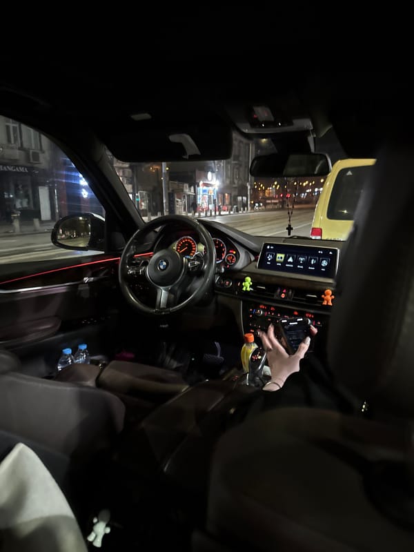Driver documents BMW interior view on Sofia street