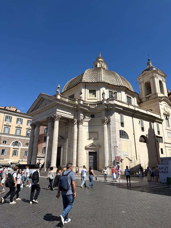 Tourist documents sunny afternoon stroll through historic Rome streets
