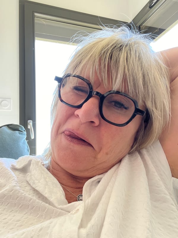 Woman takes mirror selfie in Chambœuf, France