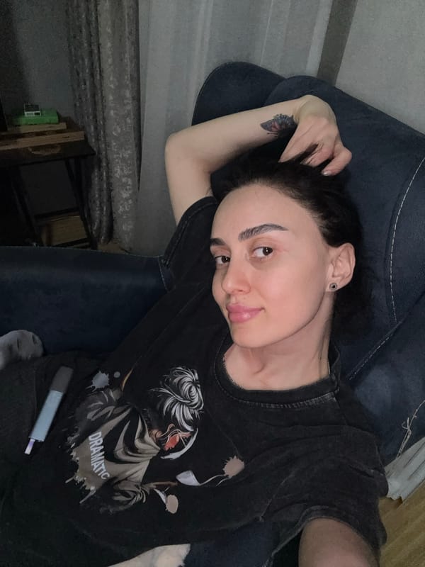 Woman prepares homemade meal in Tbilisi kitchen