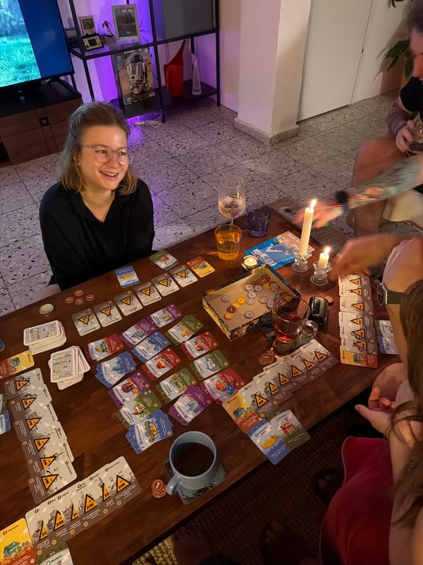 Friends gather for board game session in Ramat Gan