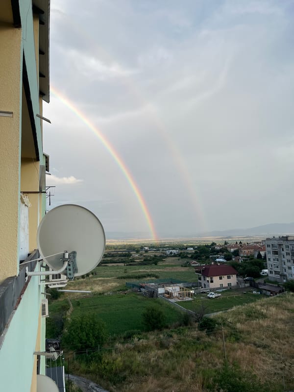 Double rainbow over Sopot, Bulgaria, seen from rooftops