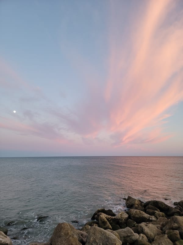 Dusk to moonrise along the Quarteira waterfront