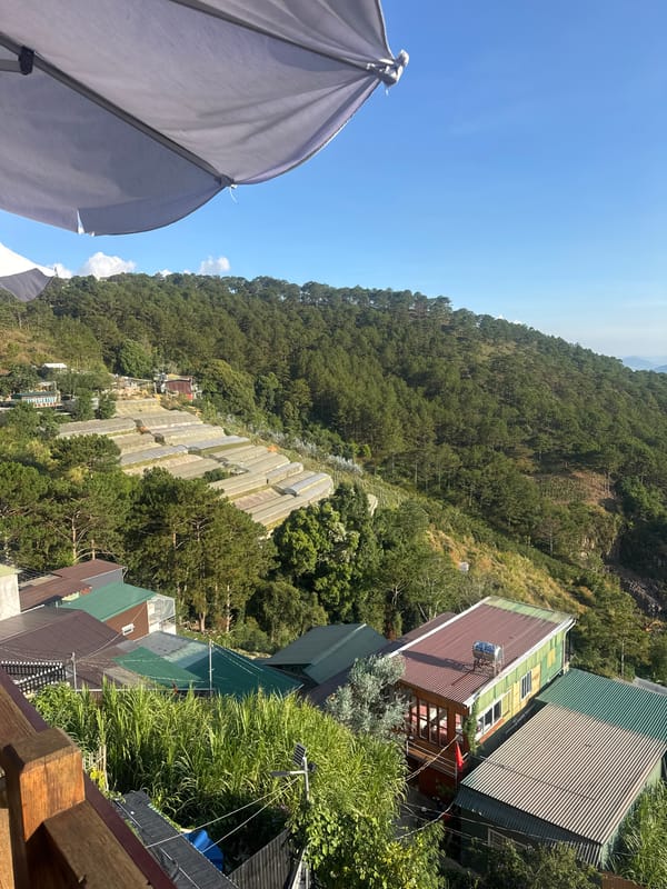 Quiet morning balcony moment overlooking Da Lat mountains