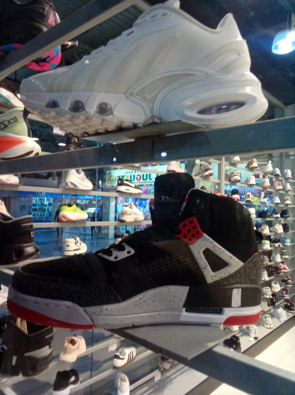 Man shops for sneakers at store in Venezuela