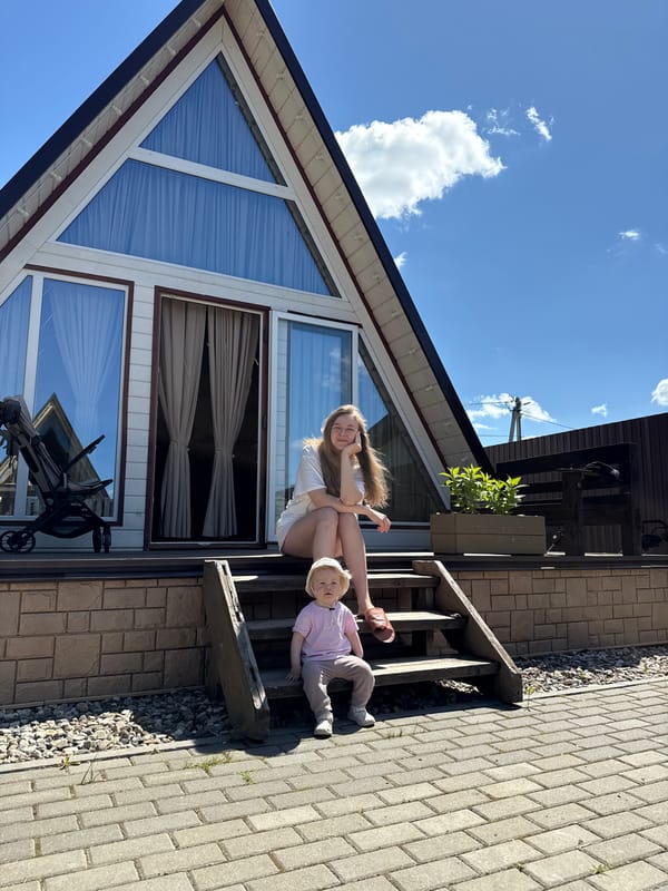 Family playtime captured in sunny Suzdal backyard