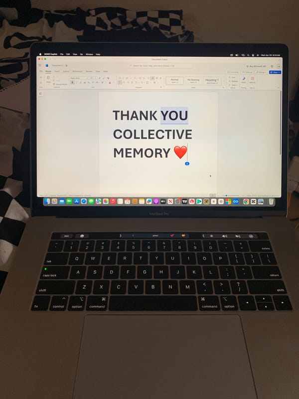 MacBook Pro with Word document spotted on checkered surface