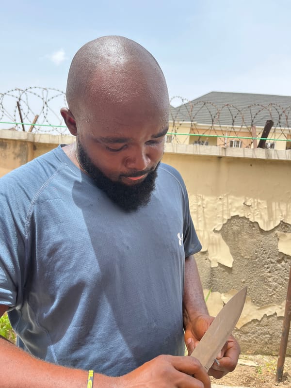 Outdoor portraits captured in Kubwa Nigeria showing man with knife