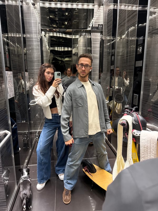 Couple Takes Selfie in Modern Elevator