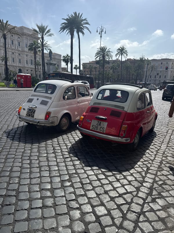 Vintage Fiat 500s spotted on Rome cobblestone street