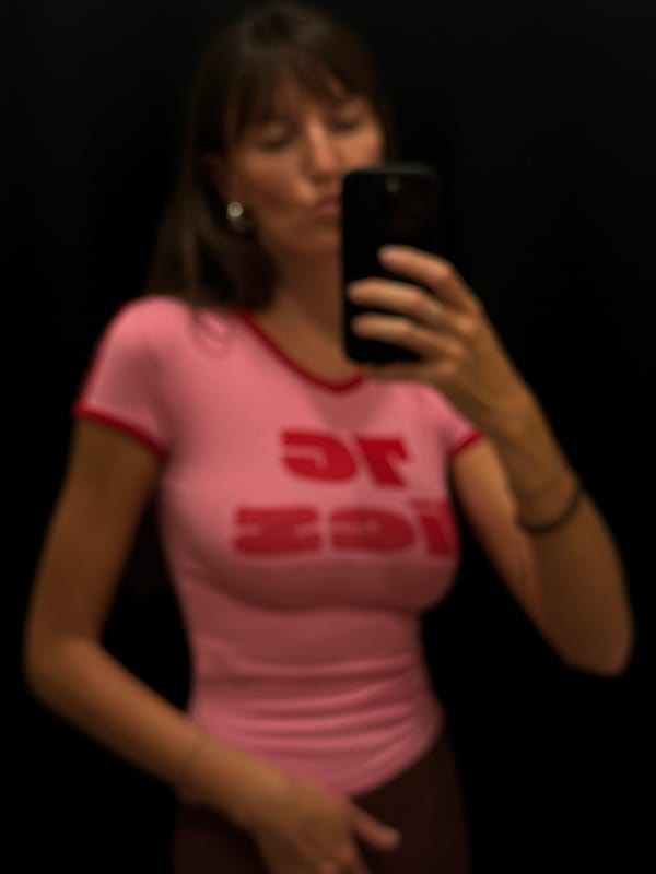 Woman takes mirror selfies in Kuta, Indonesia early morning