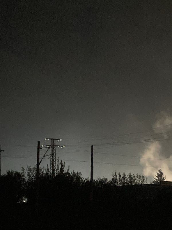 Evening power grid observed under overcast skies in Razgrad