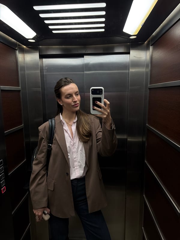 Woman Takes Selfie in Elevator in Budva
